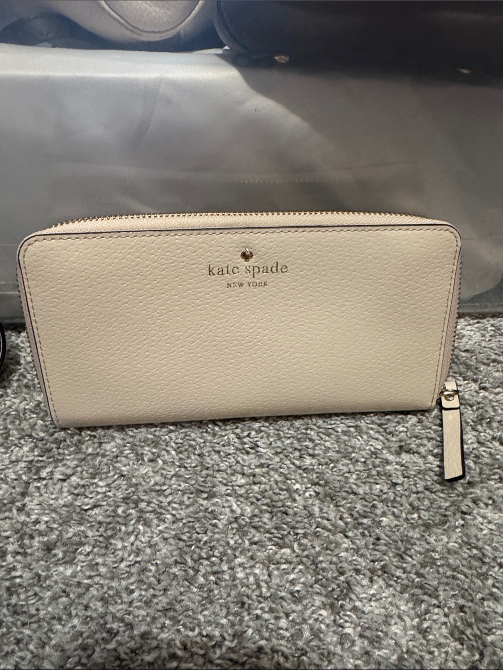 kate spade zip-around pebble leather wallet in light beige